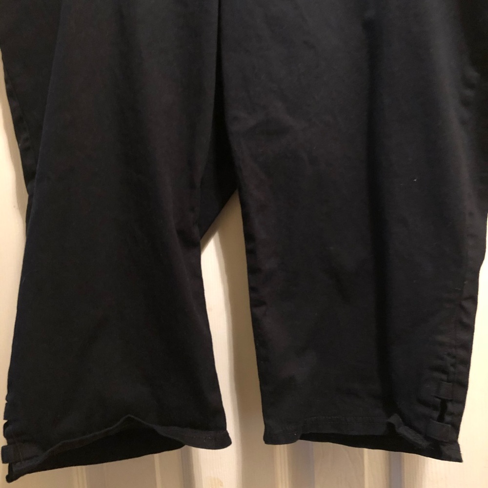 Catherine’s black flat front capris